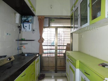 Kitchen in 1 BHK Apartment at Aman Spring, Kandivali West – for Rent