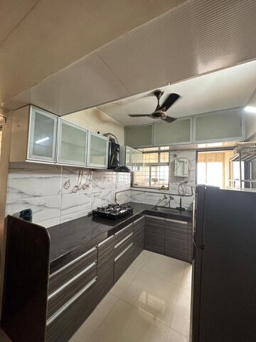 Kitchen in 2 BHK Apartment at Geeta Gold Fusion, Kharadi – for Rent