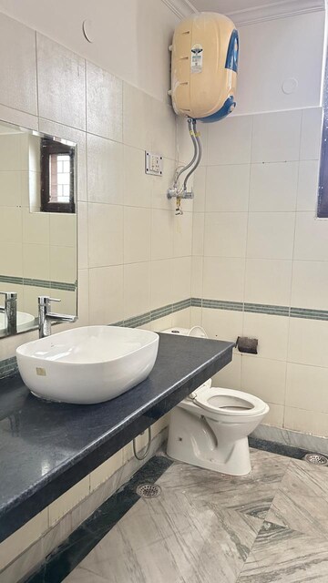 Bathroom in 3 BHK Apartment at RWA Apartments, Sector 31 – for Rent