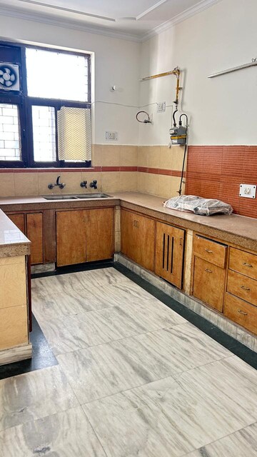 Kitchen in 3 BHK Apartment at RWA Apartments, Sector 31 – for Rent