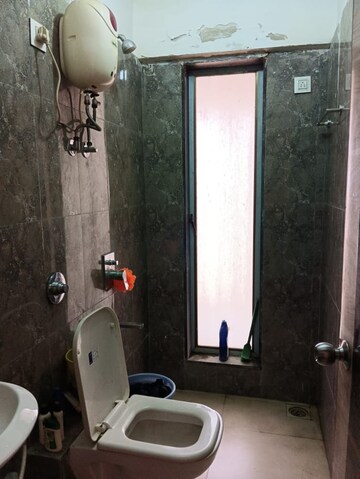 Bathroom in 3 BHK Apartment at Shakti Enclave Phase 2, Malad West – for Rent