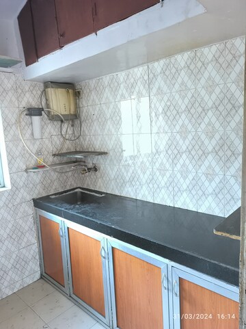 Kitchen in 1 BHK Apartment at Anand Nagar Dahisar – for Rent