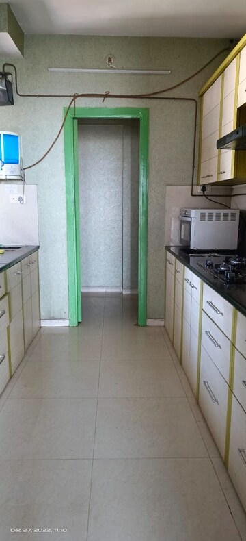 Kitchen in 3 BHK Apartment at Hiranandani Northside, Ghodbunder Road – for Rent