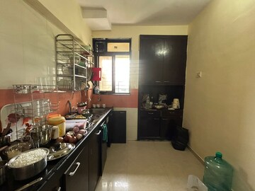 Kitchen in 2 BHK Apartment at Sai Baba Vihar Complex, Ghodbunder Road – for Rent