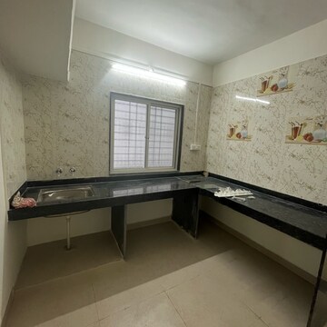 Kitchen in 1 BHK Apartment at Wadgaon Sheri – for Rent