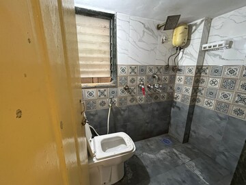 Bathroom in 2 BHK Apartment at Swastik Residency 1, Ghodbunder Road – for Rent
