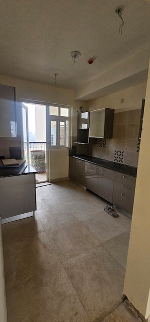 Kitchen in 2.5 BHK Apartment at Smart World Gems, Sector 89 – for Sale