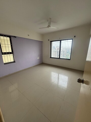 Room in 2 BHK Apartment at Windwards CHS, Wakad – for Rent