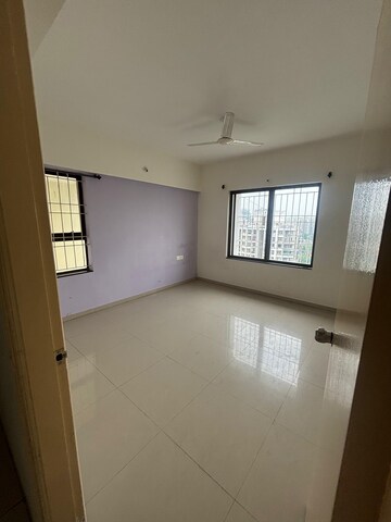 Room in 2 BHK Apartment at Windwards CHS, Wakad – for Rent