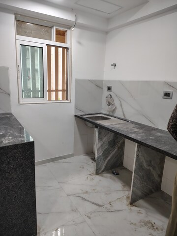 Kitchen in 2 BHK Apartment at Lodha Woods, Kandivali East – for Rent