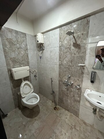 Bathroom in 2 BHK Apartment at Cosmos Empress Park, Ghodbunder Road – for Rent