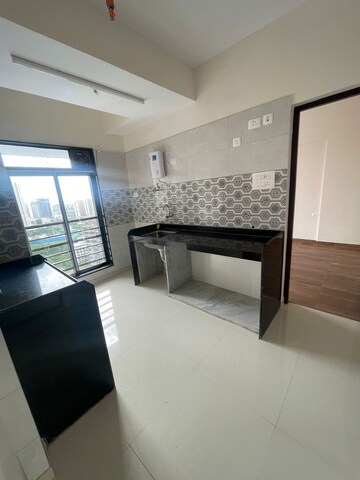 Kitchen in 1 BHK Apartment at Sanghvi S3 Ecocity Spring, Mira Road – for Sale
