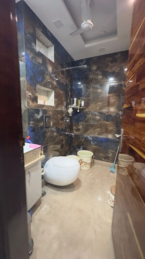 Bathroom in 3 BHK Builder Floor at Mahaveer Nagar – for Sale