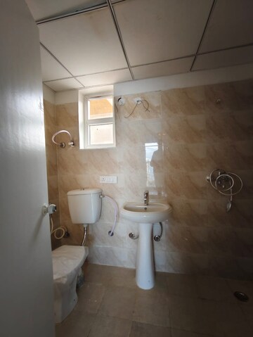 Bathroom in 2 BHK Apartment at Gaur Yamuna City 6th Park View, Gaur Yamuna City – for Rent