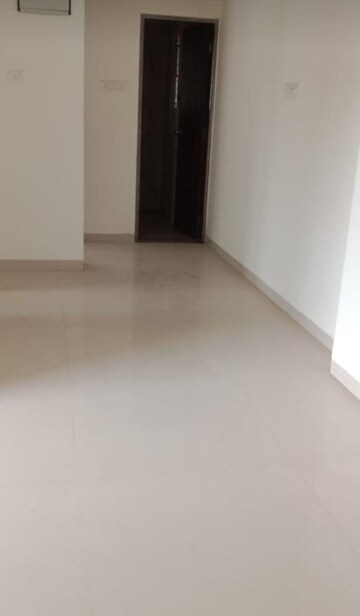 Living Room in 1 BHK Apartment at Abrol Avirahi Heights, Malad West – for Rent