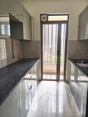 Kitchen in 2 BHK Apartment at Kalpataru Paramount, Kapur Bawdi – for Rent