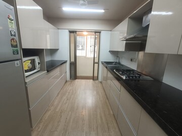 Kitchen in 3 BHK Apartment at Ekta Heritage Apartment, Khar West – for Rent