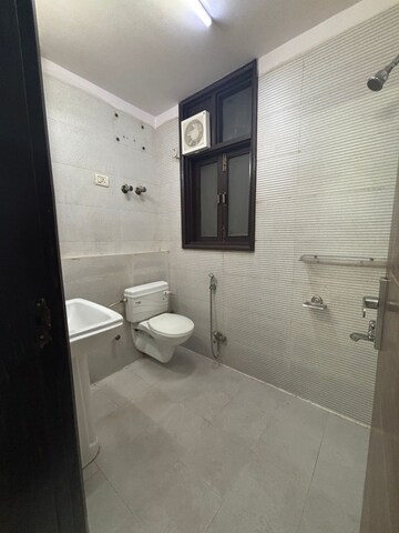 Bathroom in 1 BHK Apartment at Palm Residency Chhatarpur, Chattarpur – for Rent