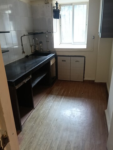 Kitchen in 1 BHK Apartment at Golders Green CHS, Borivali West – for Rent