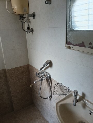 Bathroom in 1 BHK Apartment at Golders Green CHS, Borivali West – for Rent