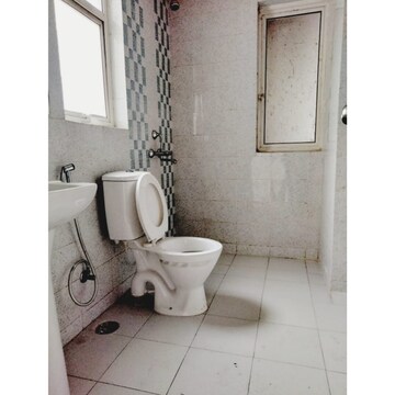 Bathroom in 2.5 BHK Apartment at Logix Blossom Greens, Sector 143 – for Rent