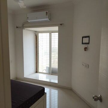 Living Room in Studio Apartment at Royal Palms, Goregaon East – for Rent