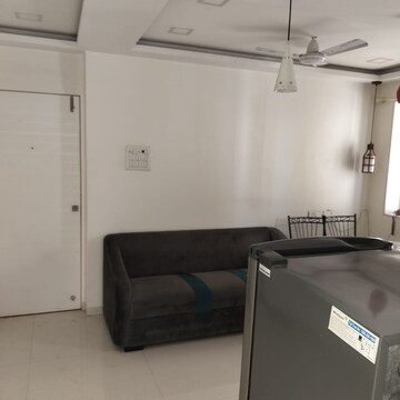 Living Room in Studio Apartment at Royal Palms, Goregaon East – for Rent