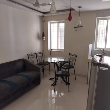 Living Room in Studio Apartment at Royal Palms, Goregaon East – for Rent