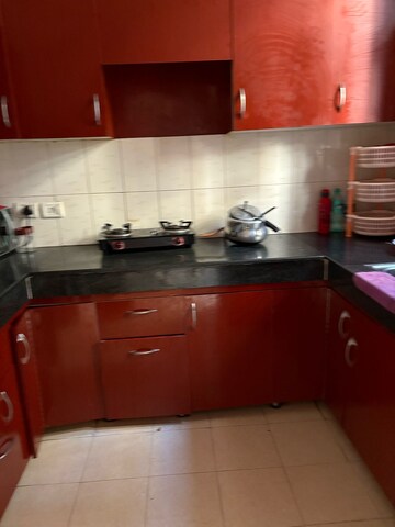 Kitchen in 3 BHK Apartment at Artique Uptown Skylla, International Airport Road – for Rent