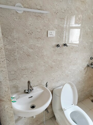Bathroom in 3 BHK Apartment at Sikka Karnam Greens, Sector 143b – for Rent