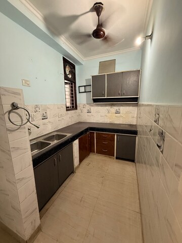 Kitchen in 2 BHK Builder Floor at Freedom Fighters Enclave – for Rent