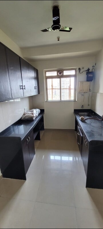 Kitchen in 2 BHK Apartment at Rustomjee Athena, Majiwada – for Rent