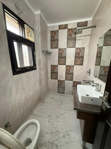 Bathroom in 3 BHK Builder Floor at Paschim Vihar – for Rent