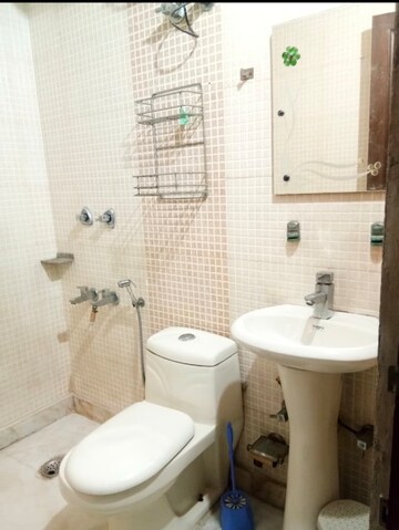 Bathroom in 2.5 BHK Builder Floor at East Of Kailash – for Rent
