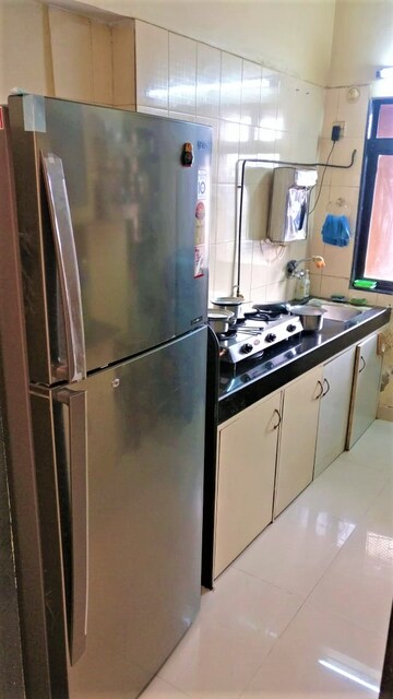 Kitchen in 2 BHK Apartment at HDIL Dheeraj Diamond, Malad West – for Rent
