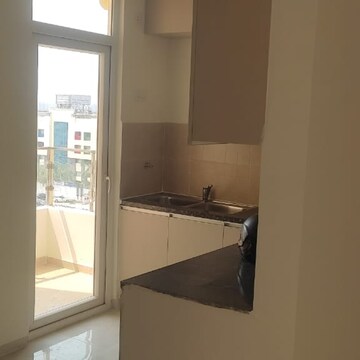 Kitchen in 3 BHK Apartment at Emenox La Solara, Panchsheel Green – for Rent