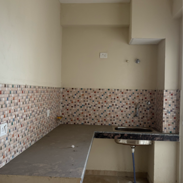 Kitchen in 2 BHK Apartment at Advitya Homes, Sector 149 – for Rent