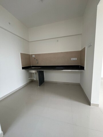Kitchen in 2 BHK Apartment at Goyal My Home Kiwale, Kiwale – for Rent