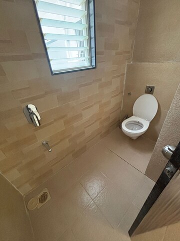 Bathroom in 2 BHK Apartment at Goyal My Home Kiwale, Kiwale – for Rent