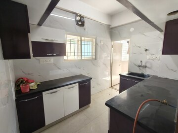 Kitchen in 3 BHK Apartment at Mayflower Apartment, Cox Town – for Rent