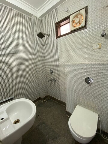 Bathroom in 3 BHK Builder Floor at Paschim Vihar – for Rent