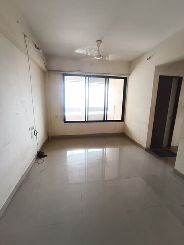 Living Room in 1 BHK Apartment at Ajmera Rosemary And Rosewood, Kalyan West – for Rent