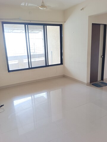 Living Room in 1 BHK Apartment at Ajmera Rosemary And Rosewood, Kalyan West – for Rent