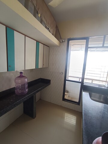Kitchen in 1 BHK Apartment at Ajmera Rosemary And Rosewood, Kalyan West – for Rent