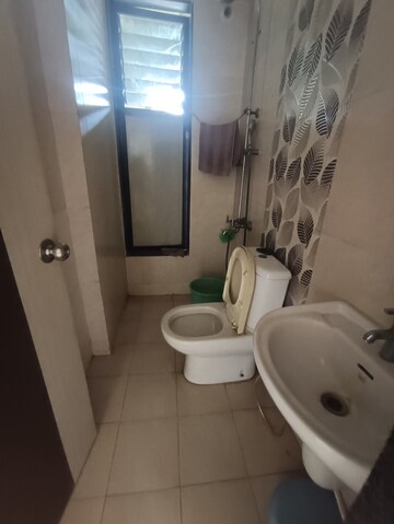 Bathroom in 1 BHK Apartment at Ajmera Rosemary And Rosewood, Kalyan West – for Rent
