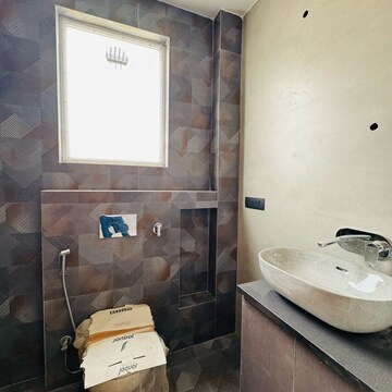 Bathroom in 3 BHK Builder Floor at Ansal API Esencia, Sector 67 – for Sale