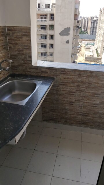 Kitchen in 2 BHK Apartment at Amrapali Silicon City, Sector 76 – for Sale