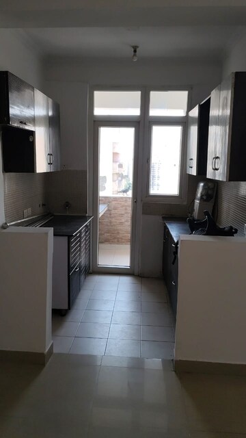 Kitchen in 2 BHK Apartment at Amrapali Silicon City, Sector 76 – for Sale