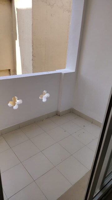 Balcony in 2 BHK Apartment at Amrapali Silicon City, Sector 76 – for Sale