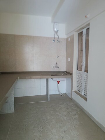 Kitchen in 2 BHK Apartment at Dosti West County, Balkum Pada – for Sale